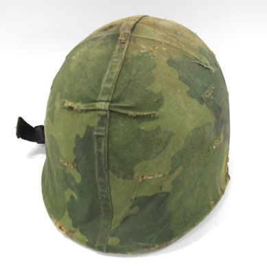 Lot 473 - United States Army M1 Combat Helmet and Liner.