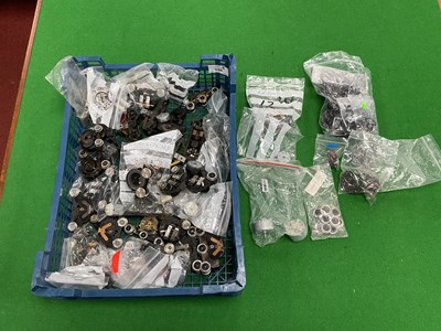 Lot 586 - Approximately forty 00 gauge motor bogies and...