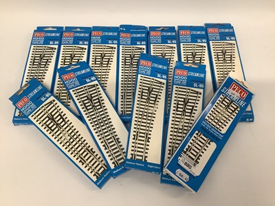 Lot 880 - Twelve boxed Peco Streamline 00 gauge...