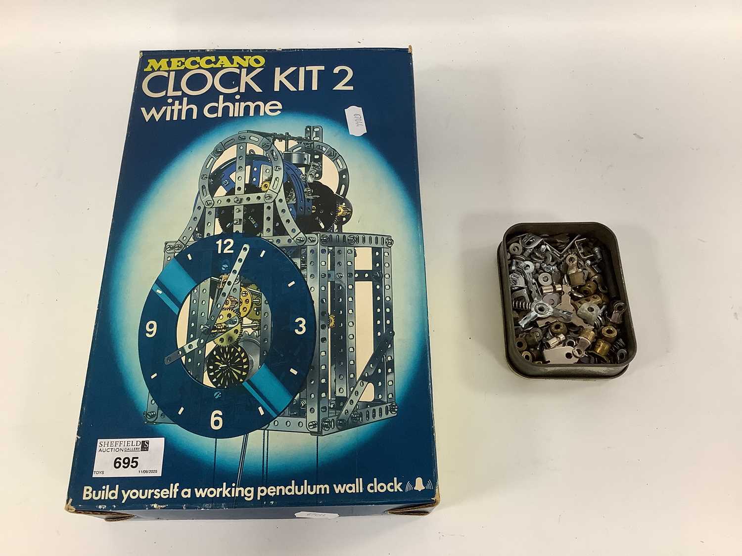 Lot 695 - A part complete Meccano Clock Kit 2. Missing