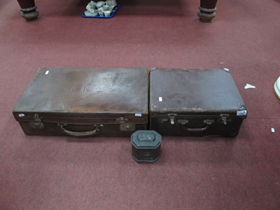 Lot 1463 - A leather suitcase initialled L.M.W. With...