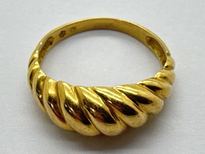 Lot 45 - A Modern Twisted Style Band, of tapered design,...