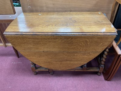 Lot 1630 - 1930s Oak Gate Leg Table, with drop leaves, on...