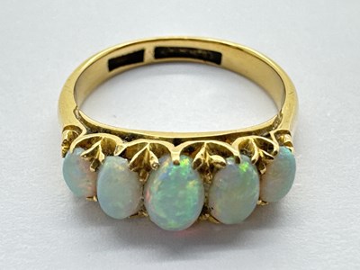 Lot 53 - An 18ct Gold Five Stone Ring, the oval stones...