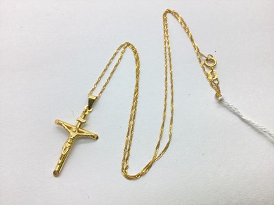 Lot 94 - A Dainty Crucifix Pendant, stamped "9KT ITALY",...