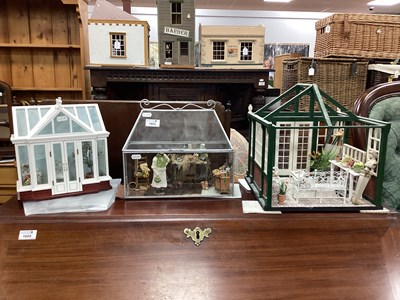 Lot 1603 - Three Models With A Garden Theme. Comprising...