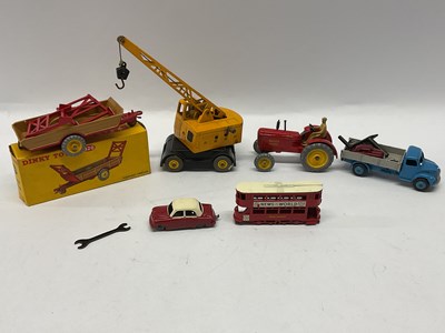 Lot 777 - A Dinky No 320 Harvest Trailer, complete, good,...