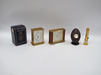 Lot 1428 - Garrard Swiss Made Brass Cased Mantle Clock 12....