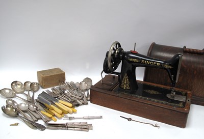 Lot 1474 - Singer Sewing Machine with accessories in a...