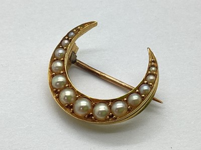 Lot 114 - An Edwardian Pearl Bead Crescent Moon Brooch,...