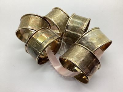 Lot 27 - A Set of Six Hallmarked Silver Napkin Rings,...