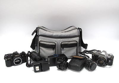 Lot 1412 - Cameras: Canon A-1 Body, Canon AV-1 with FD...