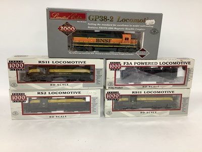 Lot 637 - Five boxed HO scale American diesels: two...
