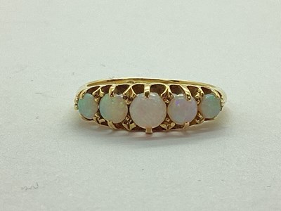 Lot 25 - An 18ct Gold Five Stone Dress Ring, the...