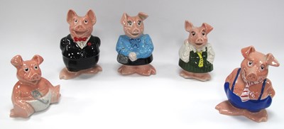 Lot 1229 - A Set of Five Wade Nat West Pottery Pig Money...