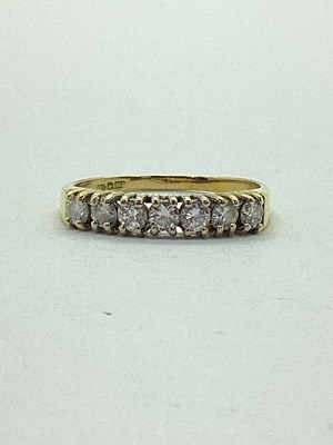 Lot 35 - An 18ct Gold Diamond Half Eternity Ring, the...