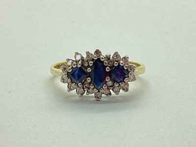 Lot 31 - An 18ct Gold Diamond and Stone Set Dress Ring,...