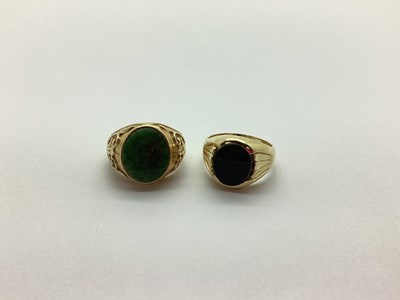 Lot 253 - Two Hardstone Inset Gent’s Rings, each oval...