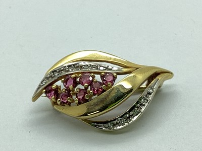 Lot 93 - A 9ct Gold Stone Set Abstract Foliage Brooch,...