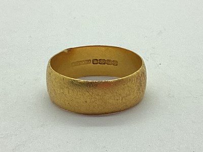 Lot 29 - A 22ct Gold Wide Wedding Band, of plain design,...