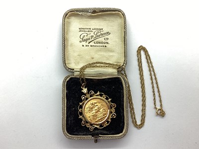 Lot 81 - George V Sovereign, 1911, loose(?) set within...