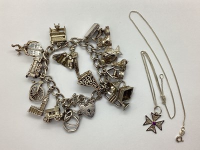 Lot 139 - A Hallmarked Silver Curb Link Charm Bracelet,...