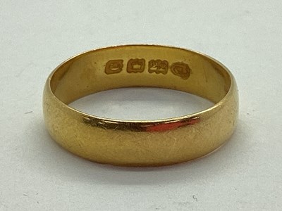 Lot 60 - A 22ct Gold Plain Wedding Band, London 1898...