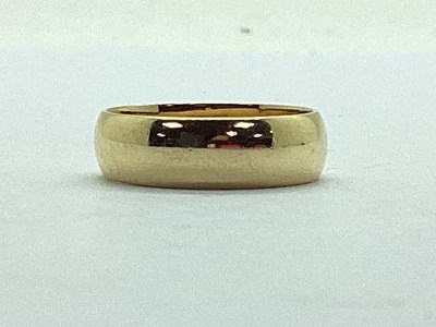Lot 49 - A Plain Wedding Band (unmarked) (finger size...