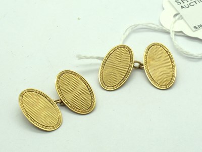 Lot 178 - A Pair of 9ct Gold Cufflinks, the engine...