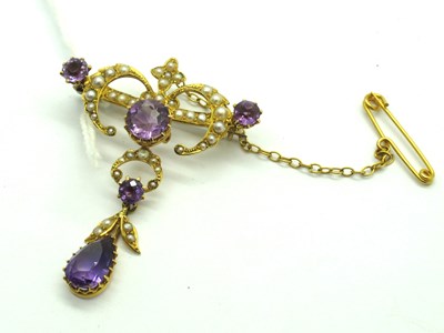 Lot 128 - An Edwardian Seed Pearl and Amethyst Brooch,...