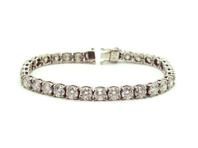 Lot 142 - A Modern Diamond Tennis / Line Bracelet, of...