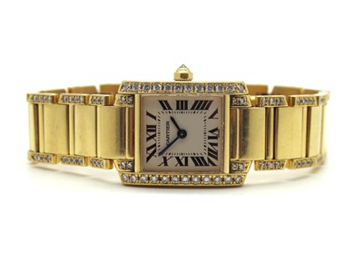 Lot 259 - Cartier; An 18ct Gold Tank Francaise Diamond...