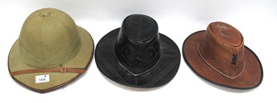 Lot 1433 - Pith Helmet Size 6.7/8, labelled Lion Safaris,...