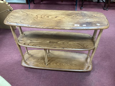 Lot 1505 - Ercol Elm and Beech Giraffe Bookcase/trolley...