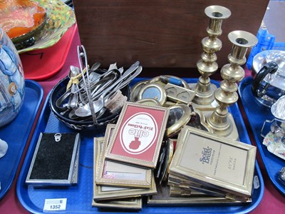 Lot 1352 - A pair of brass candlesticks, and photo frames...