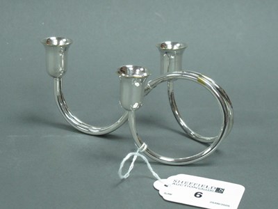 Lot 6 - Carl Christiansen; A Danish Candle Holder, of...