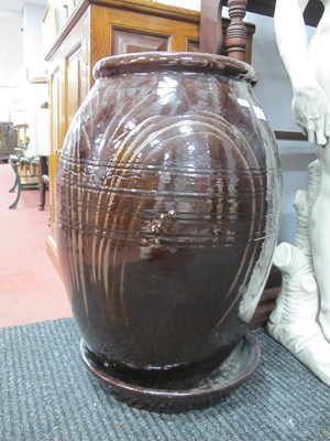 Lot 1147 - A Large Glazed Terracotta Olive Jar Style...