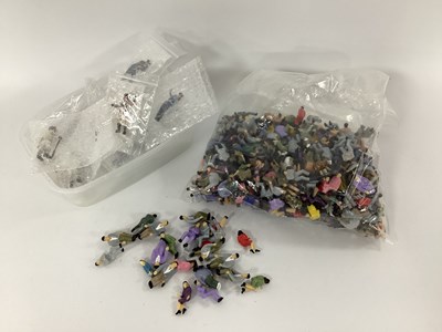 Lot 788 - A large number of painted 0 gauge figures,...