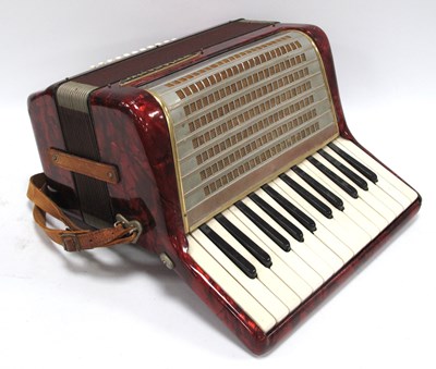 Lot 1368 - A Worldmaster Accordion, with red marbelette...