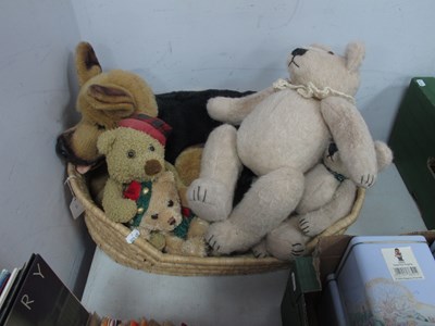 Lot 1196 - A collection of stuffed toys to include a dog...