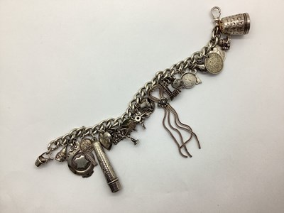 Lot 226 - A Hallmarked Silver Charm Bracelet, with...