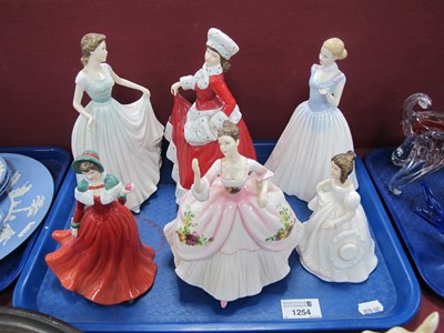 Lot 1254 - Royal Doulton lady figurines to include...