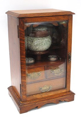 Lot 1341 - An Oak Smokers Cabinet, with glass door and...