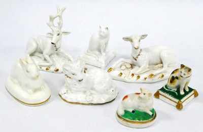 Lot 1078 - A Rockingham Works Model of a Seated Faun, on...