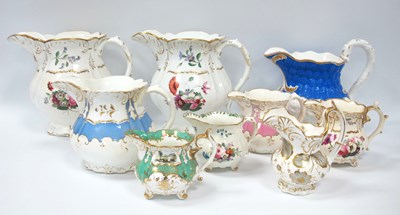 Lot 1128 - A Pair of XIX Century Porcelain Jugs, painted...