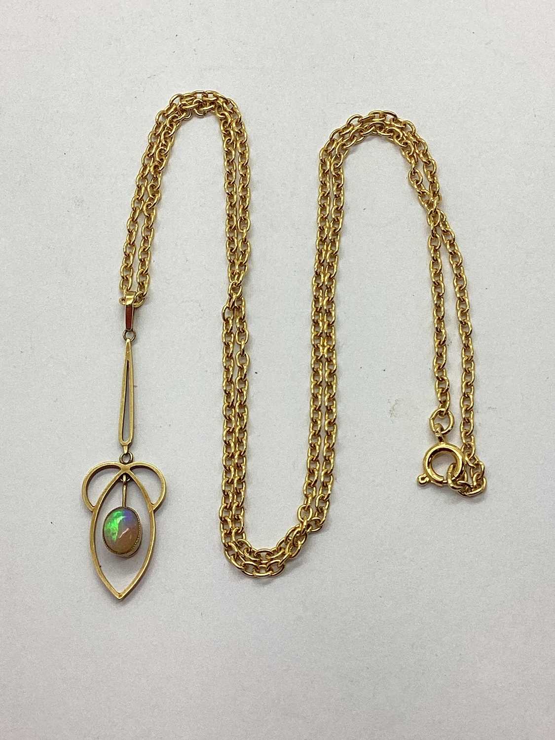 Lot 149 - An Edwardian Opal Set Openwork Pendant, oval...