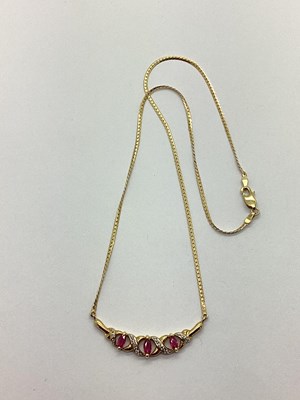 Lot 135 - A Modern 9ct Gold Ruby Inset Necklace,...