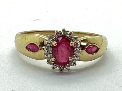 Lot 51 - A Modern 9ct Gold Ruby and Diamond Dress Ring,...