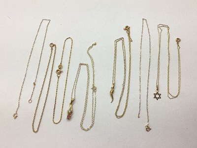 Lot 155 - A Dainty Stone Set Pendant, stamped "375", on...