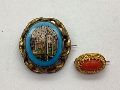 Lot 215 - A Dainty Victorian Coral Brooch, oval claw set...